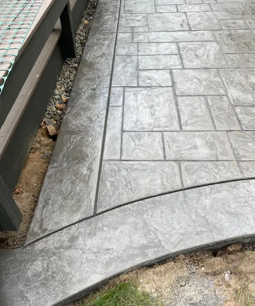 Decorative Stamped Concrete Patio With Integral Color And Decorative Borders in Renton 